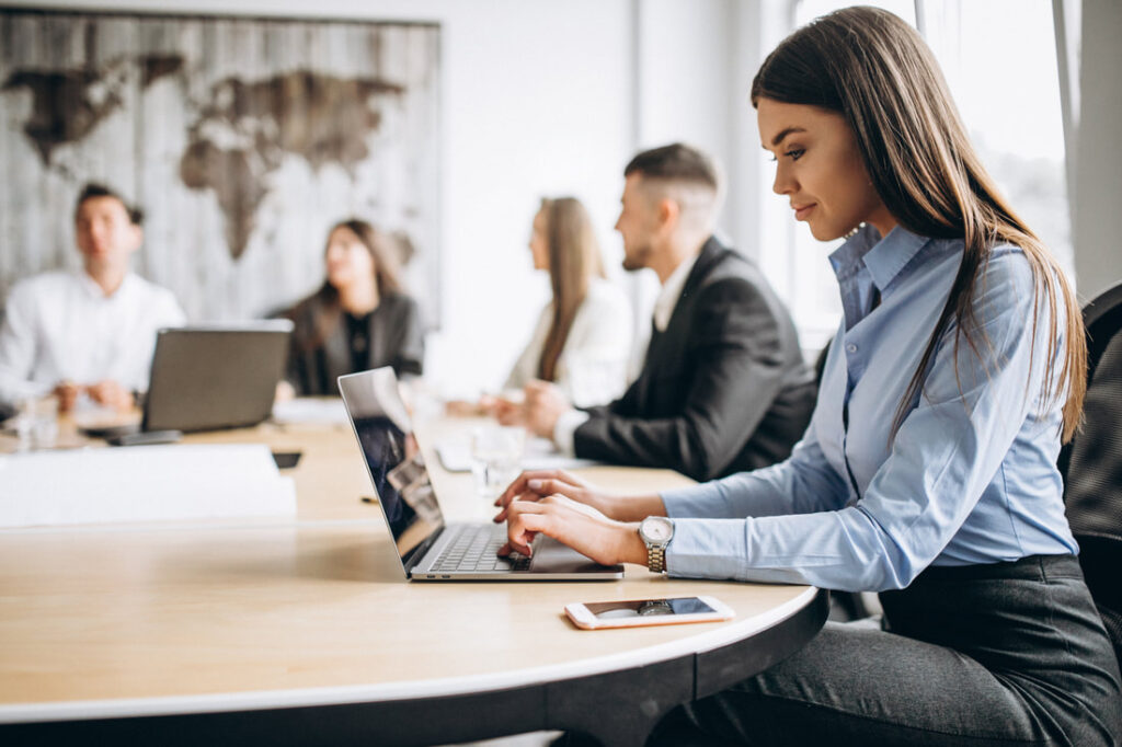 group-of-people-working-out-business-plan-in-an-office_orig
